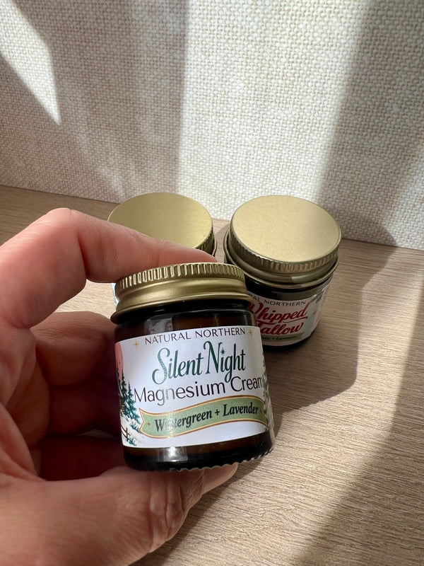 A limited edition mini  1oz holiday jar of Natural Northern in Minocqua WI's bestselling magnesium cream in the blend wintergreen and lavender. Magnesium cream is a topical cream applied on the feet, calves, knees, or sore muscles for soothing and calm support. 